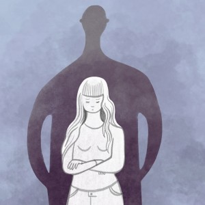 Shadow behind scared girl
